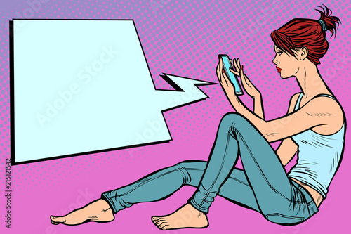 Woman sitting on the floor and reading smartphone