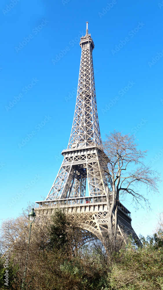 The Eiffel Tower in a clear day with blue Sky