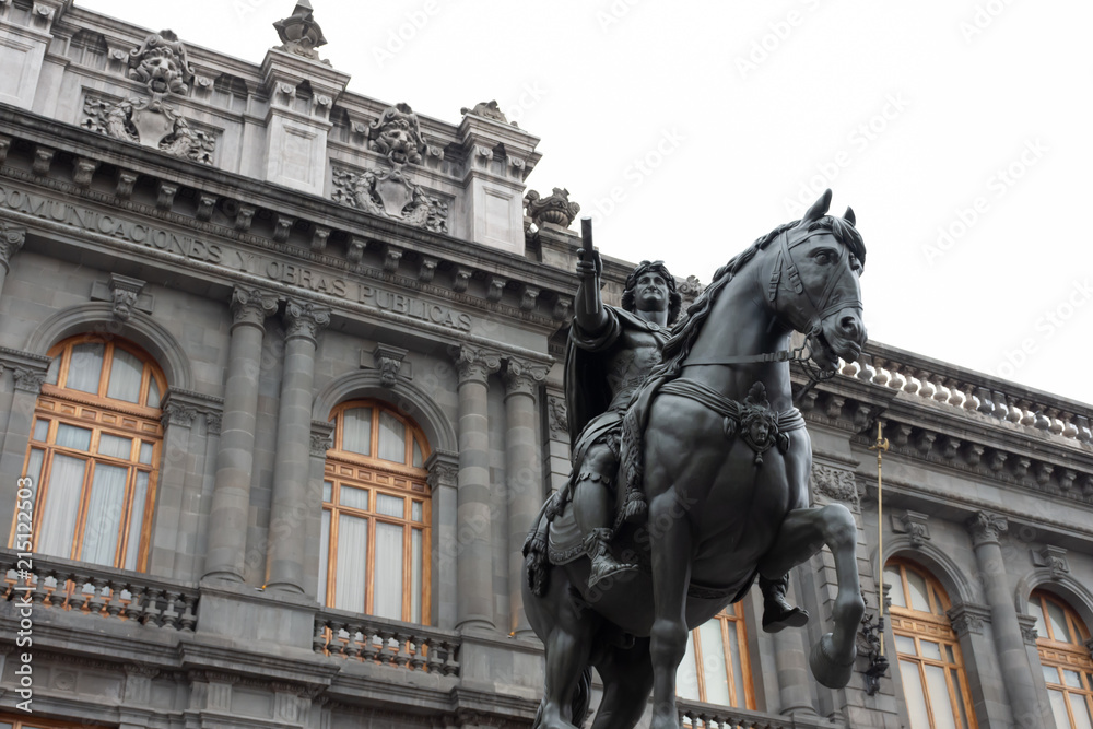 Equestrian sculpture of Charles IV of Spain located at Manuel Tolsa square in Mexico city downtown. This sculpture is better know as "El caballito" - obrazy, fototapety, plakaty 