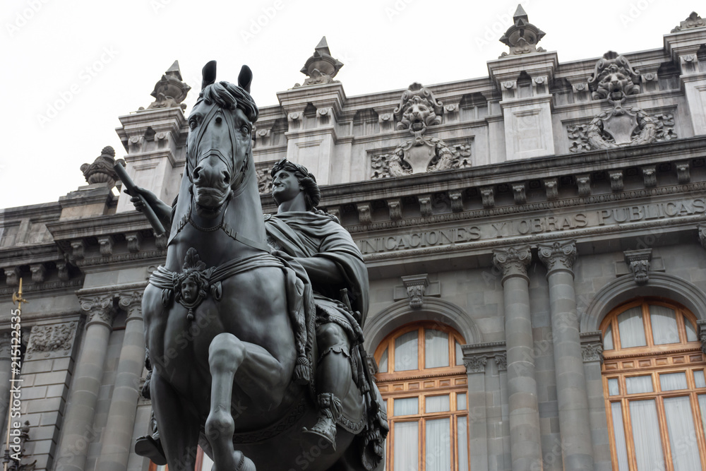 Equestrian sculpture of Charles IV of Spain located at Manuel Tolsa square in Mexico city downtown. This sculpture is better know as "El caballito" - obrazy, fototapety, plakaty 