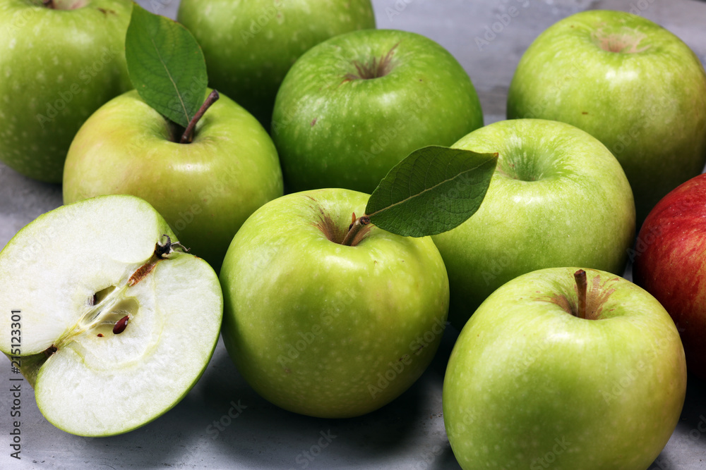 Ripe red apples with leaves on wooden background. Ripe red apples with leaves on wooden background.