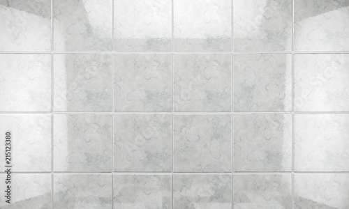 Fondo de baldosas limpias y brillantes blancas en el baño.Concepto de limpieza e higiene en el hogar. photo