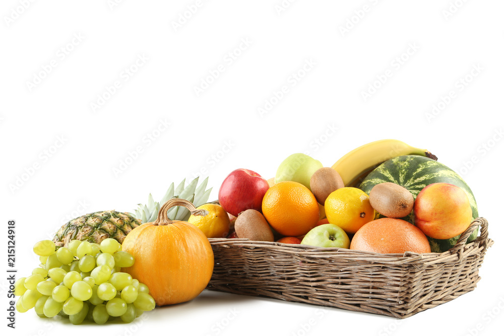 Different ripe fruits in basket on white background