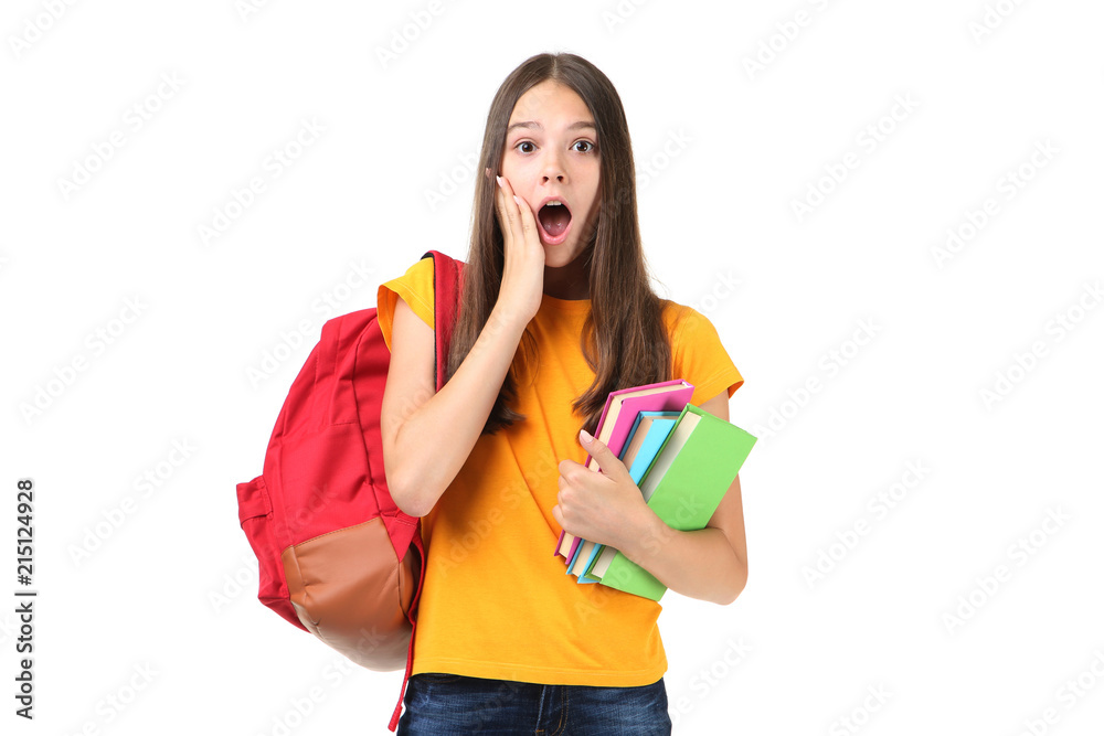 Young girl with backpack and books on white background Young girl with backpack and books on white background