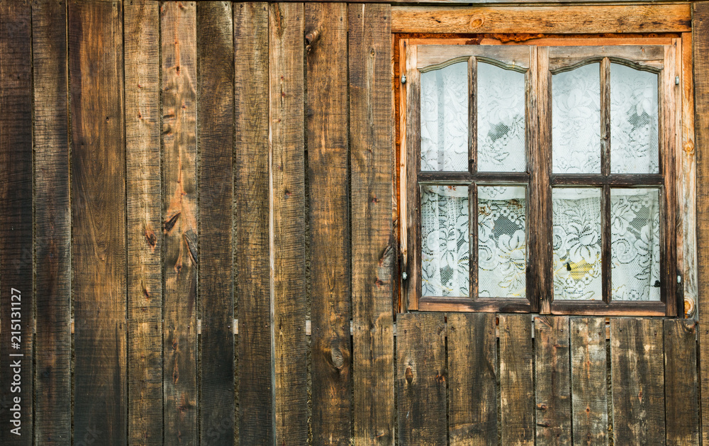 old wooden window in an old wooden house