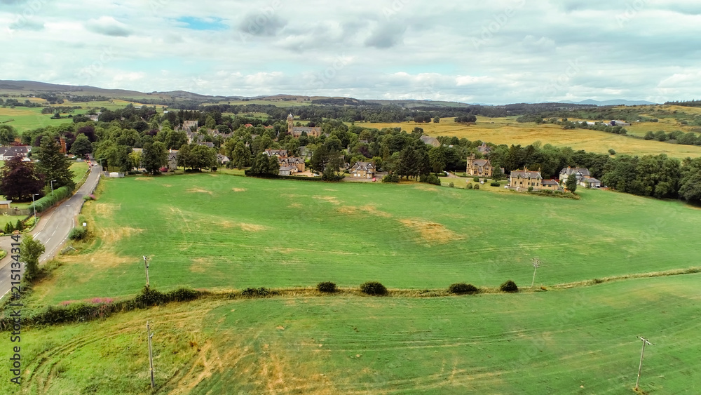 Aerial image over Quarriers village and surrounding countryside in West Central Scotland.