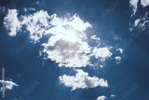 Blue sky with clouds and sun. Perfect background