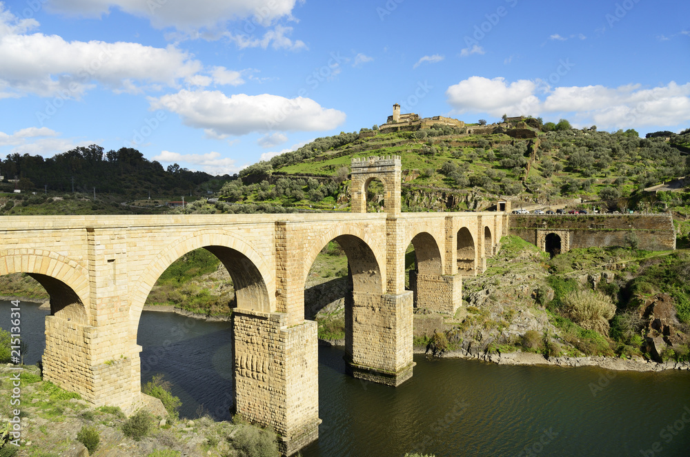 The roman bridge of Alcantara (Trajan's Bridge) is a stone arch bridge built over the Tagus river at Alcantara in 106 AD by an order of the Roman emperor Trajan. It is fully operational today. Extremadura, Spain The roman bridge of Alcantara (Trajan's Bridge) is a stone arch bridge built over the Tagus river at Alcantara in 106 AD by an order of the Roman emperor Trajan. It is fully operational today. Extremadura, Spain