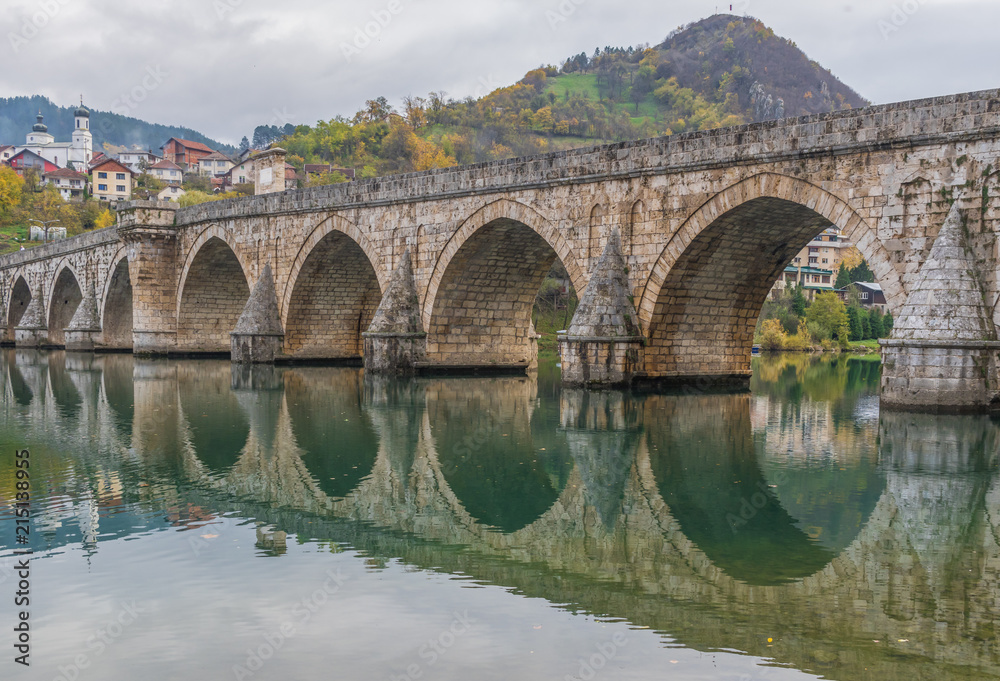 Fototapeta premium Visegrad, Bosnia & Herzegovina - the Mehmed Paša Sokolovic Bridge is one of the main landmarks in the country, and Visegrad one of the pearls of the Balkans