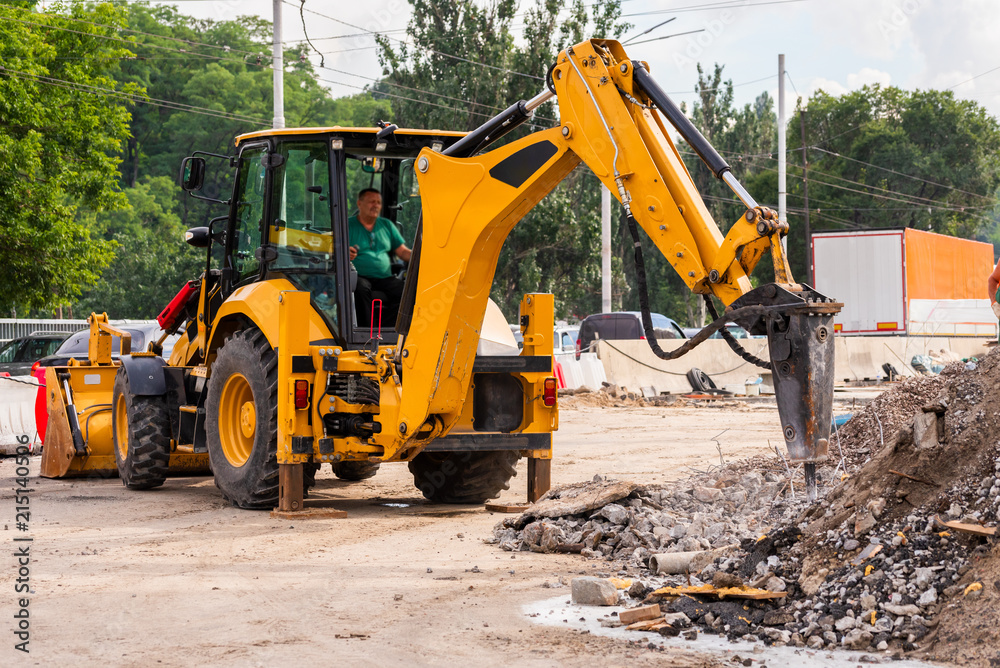 large construction machinery, special car for repairing yellow color with pneumatic hammer large construction machinery, special car for repairing yellow color with pneumatic hammer