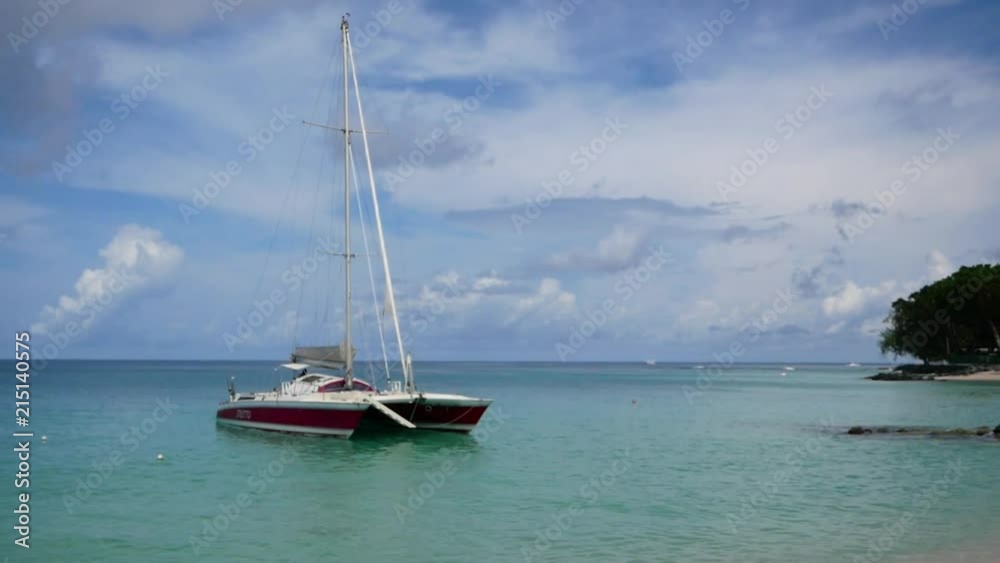 Catamaran moored on the west coast of Barbados. Catamaran moored on the west coast of Barbados.