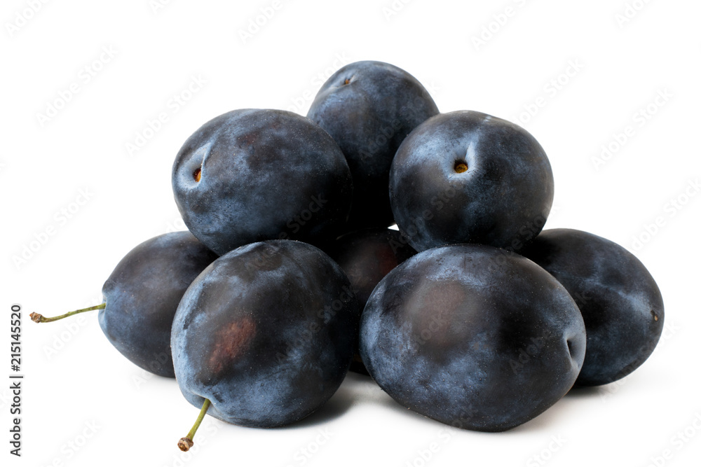 A bunch of ripe plums on a white, isolated. A bunch of ripe plums on a white, isolated.