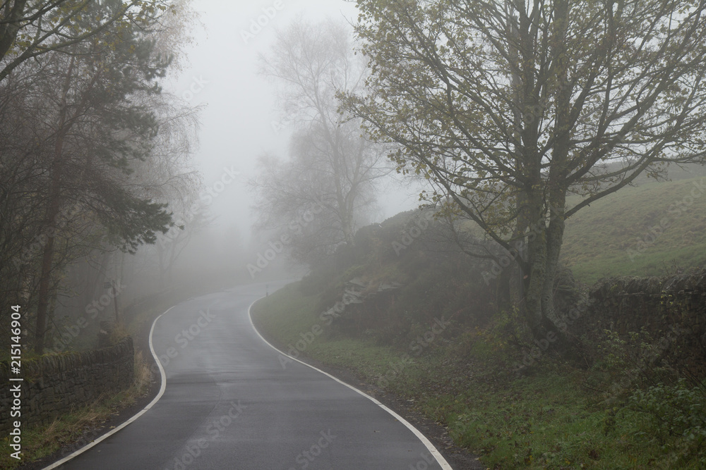 foggy road in the Peak District, UK