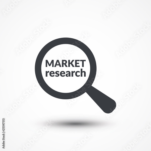 Magnifying glass with words market research on white background