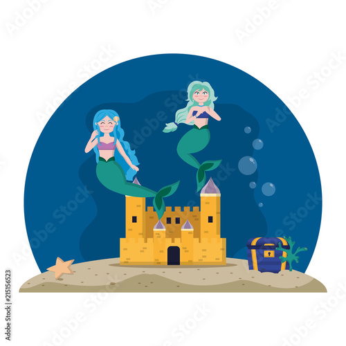nice mermaids under water with castle and coffer