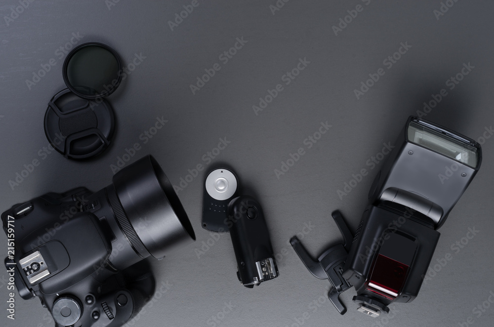 Photography concept with dslr lense flash and acessories