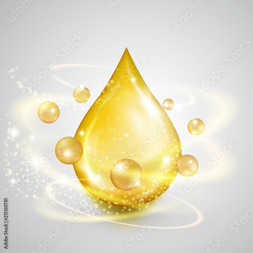 Falling drop of golden oil with shiny winds. Precious liquid skin care emulsion, symbol of organic nutrition, natural make up components, healthy cooking, ecological production, isolated on white.