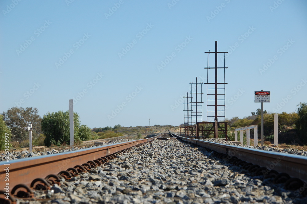 Railway track in South Australia near the town of Woomera. Shot in Summer. Railway track in South Australia near the town of Woomera. Shot in Summer.