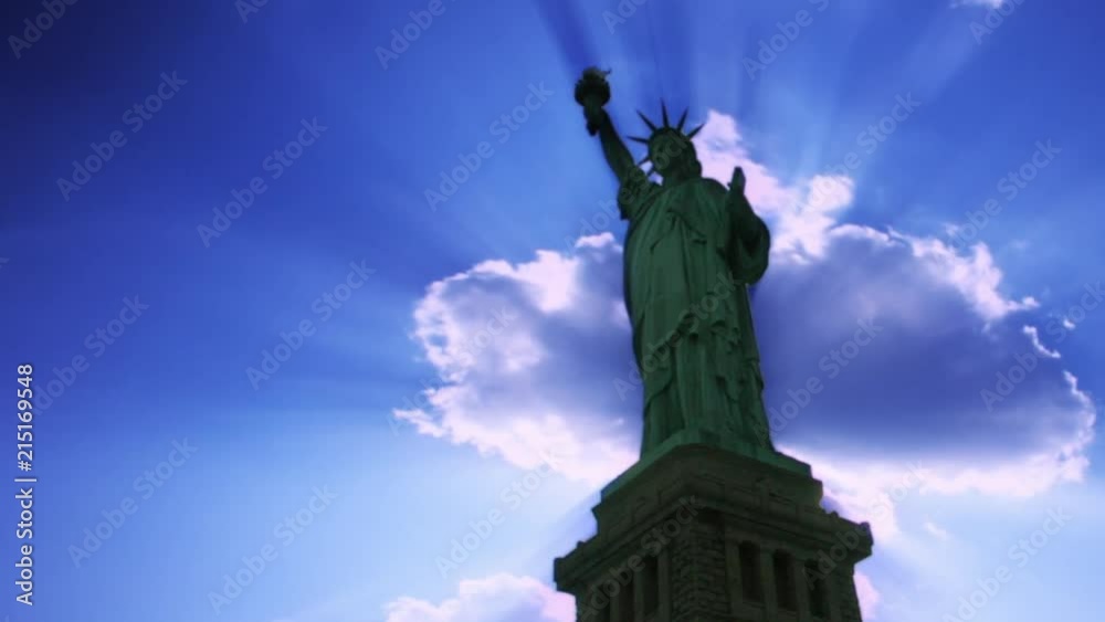 Timelapse of Statue of Liberty with sunbeams Manhattan New York Timelapse of Statue of Liberty with sunbeams Manhattan New York