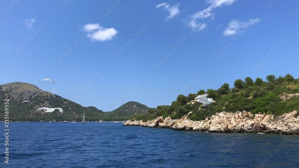 People enjoying the summer sailing on boat or spending a sunny day on the beach People enjoying the summer sailing on boat or spending a sunny day on the beach