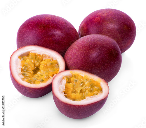 whole and half of passion fruit isolated on white background