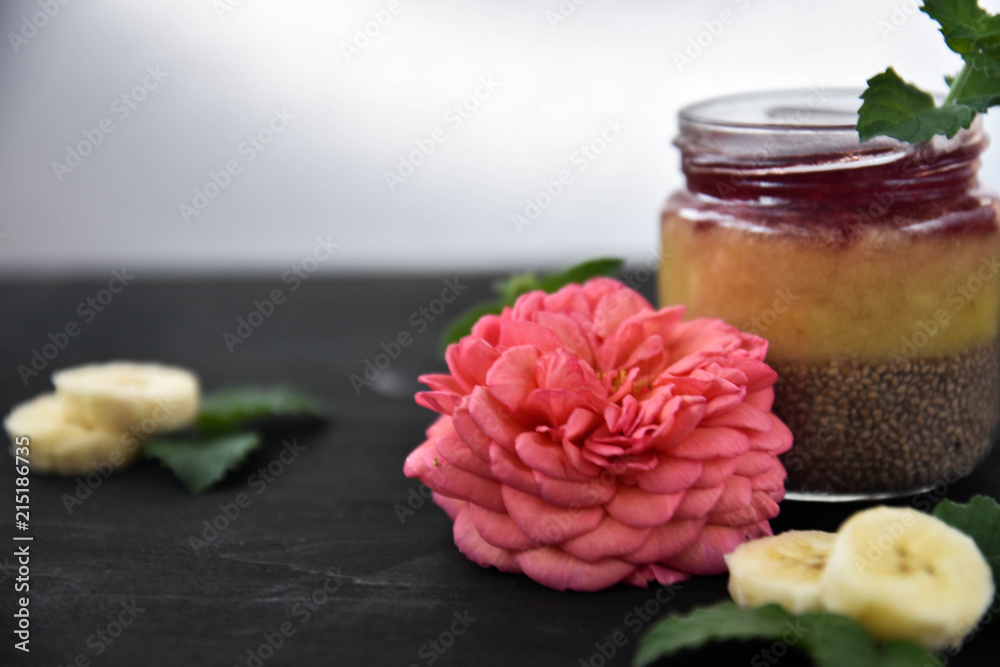 desert chia pudding. tea rose with banana. art soft focus desert chia pudding. tea rose with banana. art soft focus