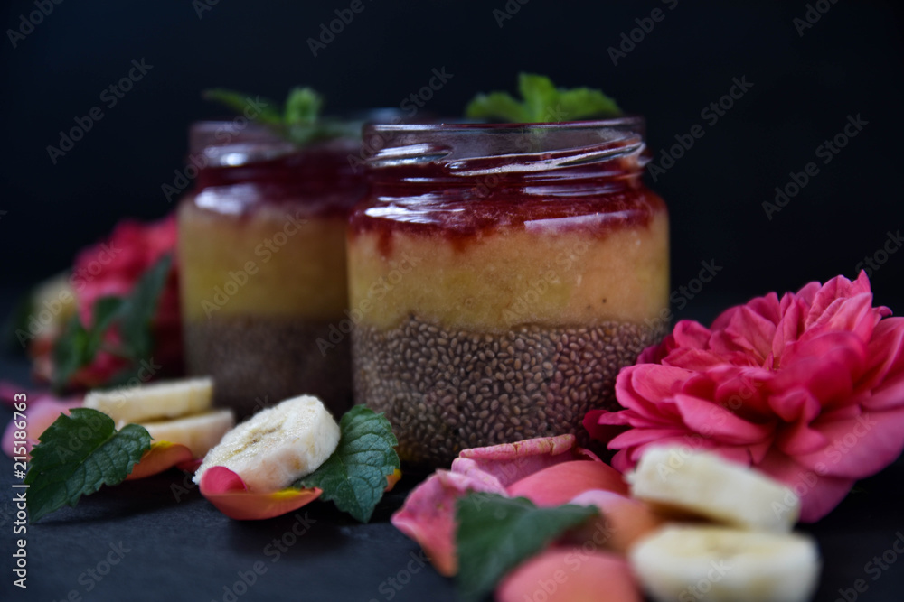 desert chia pudding. tea rose with banana. art soft focus desert chia pudding. tea rose with banana. art soft focus