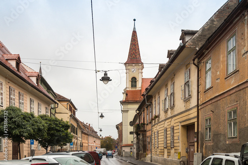 Mitropoliei street in a rainy day in Sibiu city in Romania photo