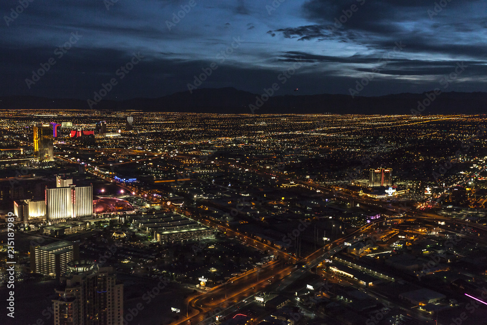 Las Vegas metropolitan city lights stretching out to the mountain at night