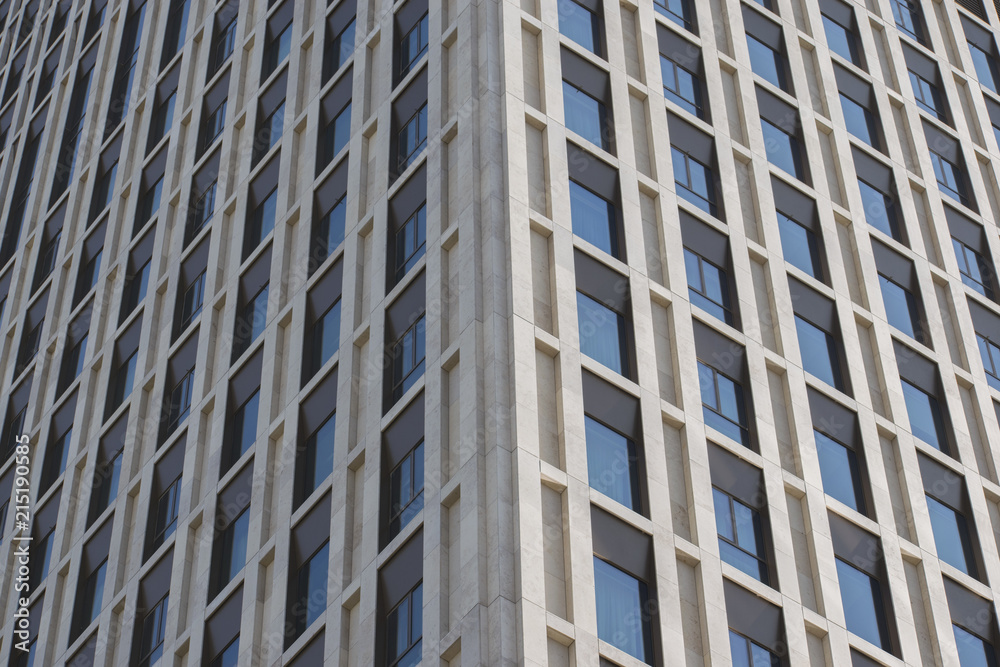 texture of a skyscraper, walls of a high-rise building with windows