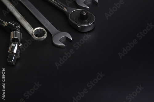 The wrench steel tools for repair on black background.