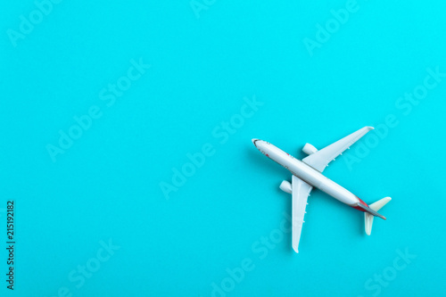 Airplane on blue pastel color background.