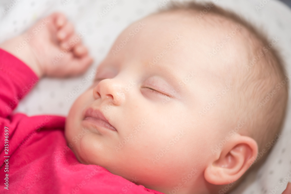 Portrait of baby sleeping in a crib, close up Portrait of baby sleeping in a crib, close up