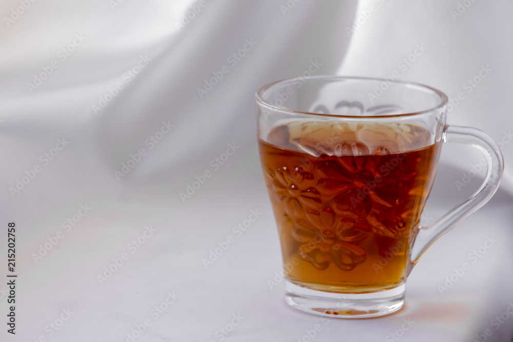 A glass of tea isolated on white A glass of tea isolated on white