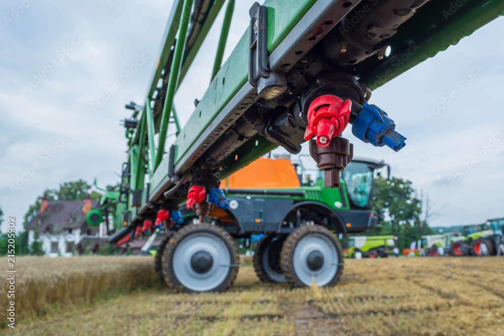 a modern sprayer bar with various nozzles for different conditions of application of chemistry. High ground clearance a modern sprayer bar with various nozzles for different conditions of application of chemistry. High ground clearance