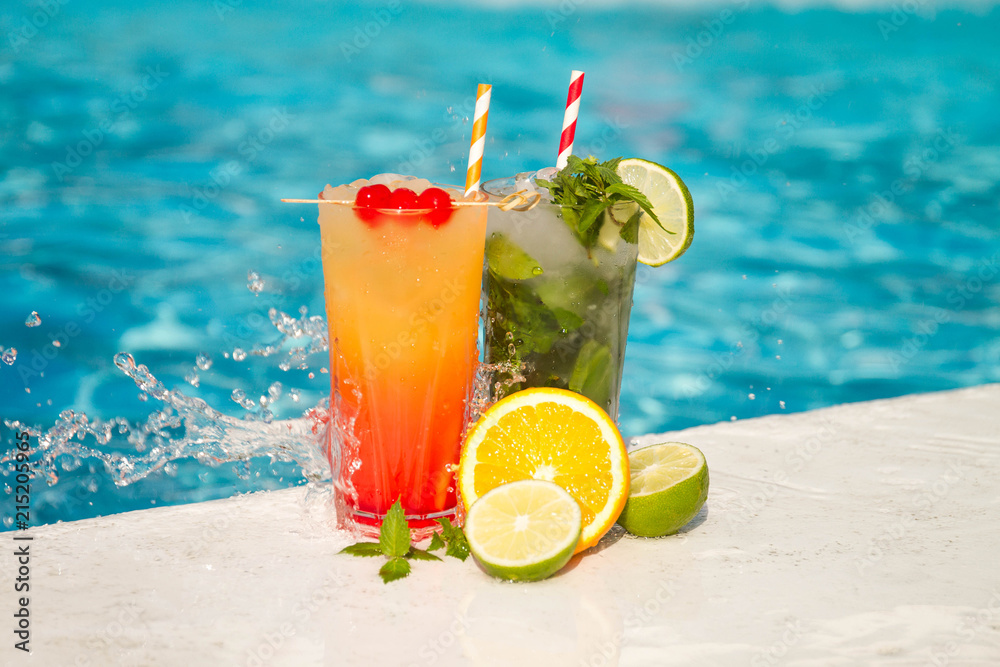 Tropical cocktail on a pool background