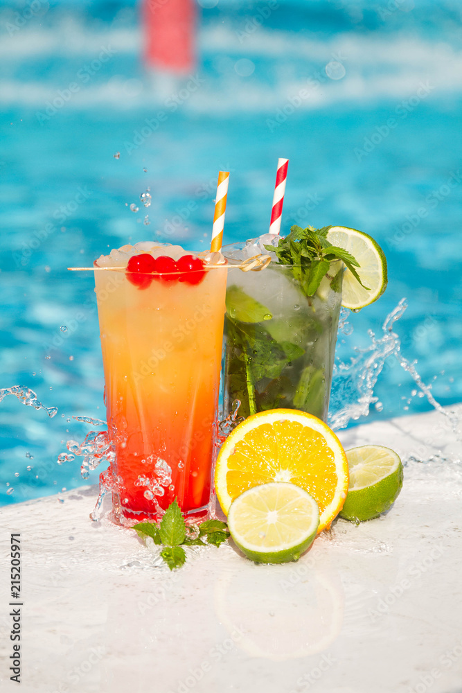 Tropical cocktail on a pool background
