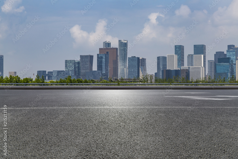 Panoramic skyline and modern business office buildings with empty road,empty concrete square floor