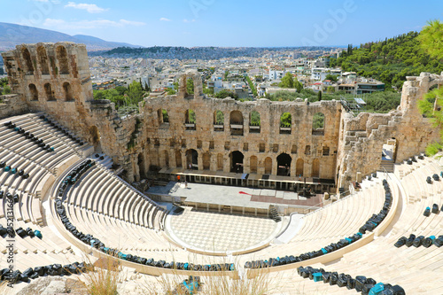 ATHENS, GREECE - JULY 18, 2018: Ancient theater in a summer day in the Acropolis. The Odeon of Herodes Atticus on the south slope of the Acropolis in Athens, Greece. 