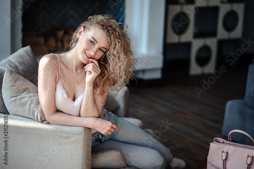 Close-up portrait of sweet blonde woman in a casual jeans clothes, fashion beauty photo