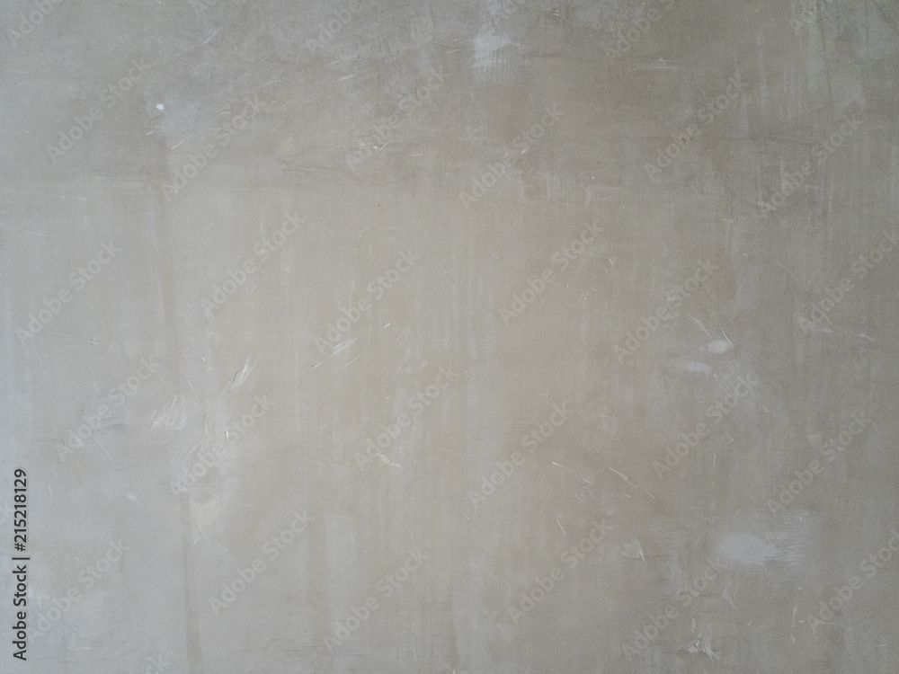 Concrete gray wall in a room without repair