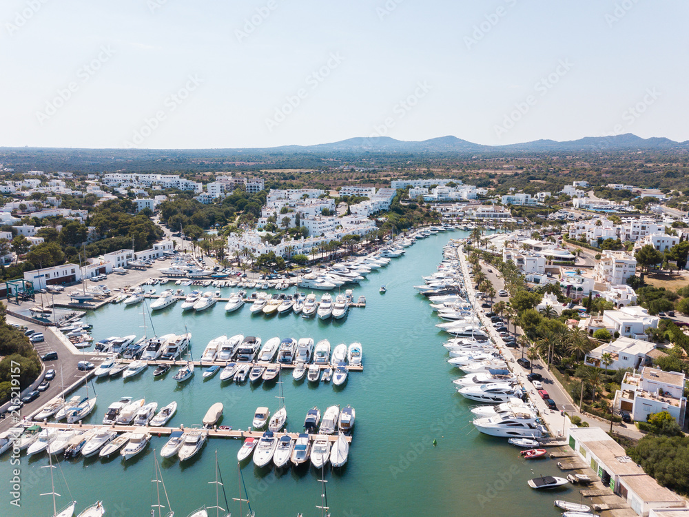 Aerial: Jetty of Cala D'Or resort town in Mallorca, Spain