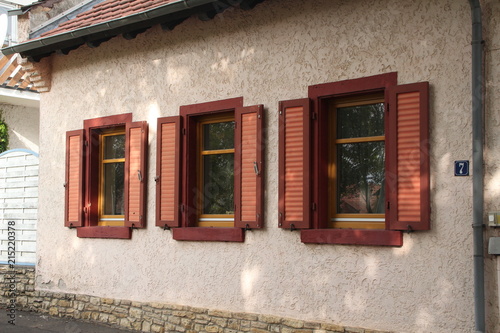Three Brown Windows