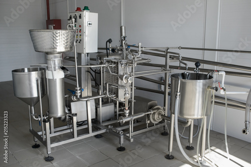 Industrial separator in dairy production. Separator complete with centrifugal pump. Technological equipment for milk processing