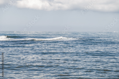 View of the sea, waves and calm wind.