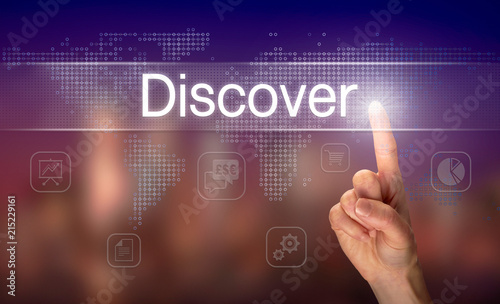 A hand selecting a Discover business concept on a clear screen with a colorful blurred background.
