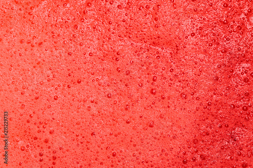 red organic texture of vegetable smoothie