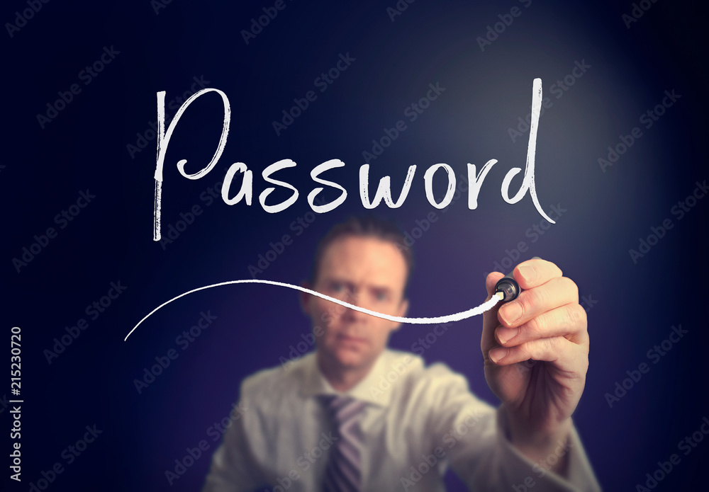 A businessman writing a password concept with a white pen on a clear screen. A businessman writing a password concept with a white pen on a clear screen.