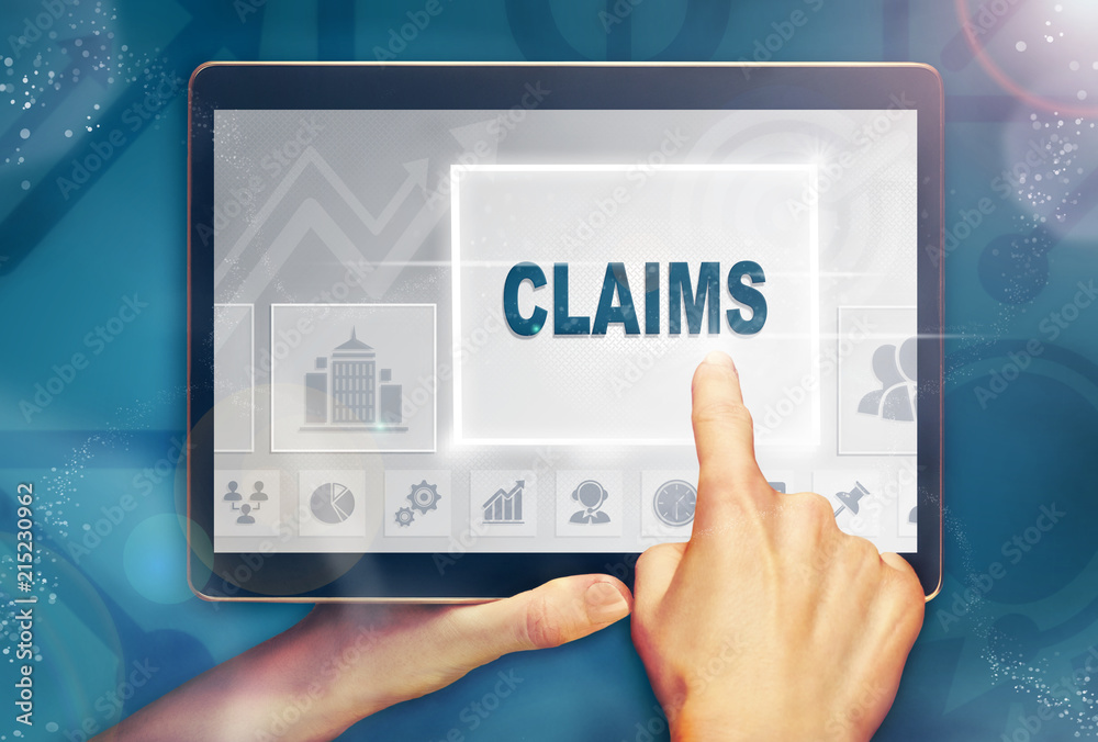 A hand selecting a claims business concept on a computer tablet screen with a colorful background.