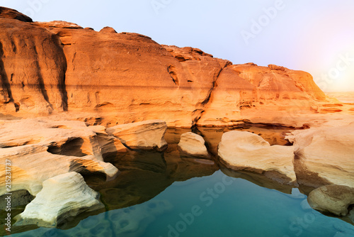 Sunrise new day at Sam Phan Bok, as known as the Grand Canyon of Thailand, the biggest rock reef in the Mae Khong River, in Ubon Ratchathani province, Thailand photo